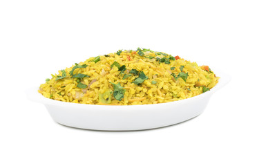 Indian Breakfast Dish Poha Also Know as Pohe or Aalu poha made up of Beaten Rice or Flattened Rice. The rice flakes are lightly fried in oil with mustard, chilly, onion, curry leaves and turmeric