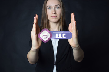 A businessman shows an inscription:LLC