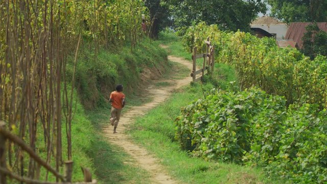 Boy running on a path