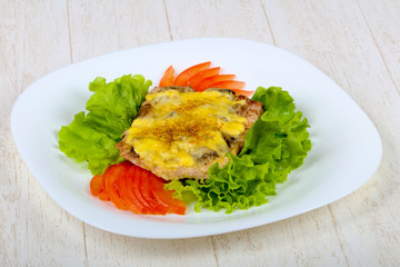 Pork steak with mushroom and cheese