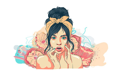 beautiful girl looks at herself and touches her face