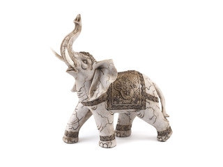 A realistic elephant figurine isolated over a white background