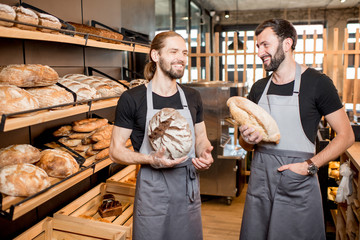 Bread sellers working at the bakery shop