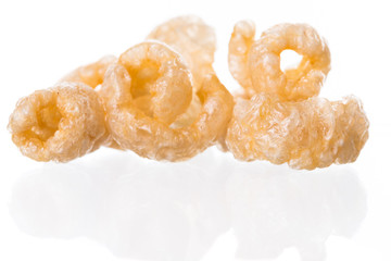 Pork rinds also known as chicharon or chicharrones, deep fried pork skin