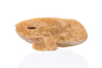 Dried palm sugar isolated on white