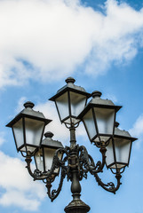Fototapeta na wymiar SASSARI, SARDEGNA, Lamp in Piazza Italia, Sassari, Sardinia, Italy