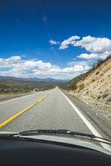 Passenger's Seat Perspective on Remote High Desert Highway