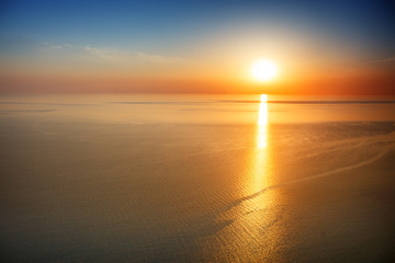 Sunset view from mountaintop. Tourism, travel, sea background.