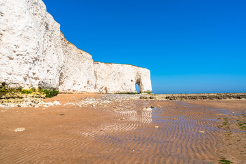 View of white chalk cliffs and beach in Kingsgate Bay, Margate, East Kent, UK
