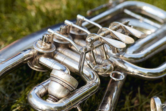 Closeup of an old musical instrument of a tenor or baritone or trumpet.