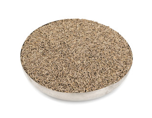 Pile of Dried Cumin Seeds Also know as caraway, jira or jeera seeds used in oriental cuisine isolated on white Background