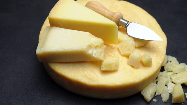 Video Whole round Head of parmesan or parmigiano hard cheese