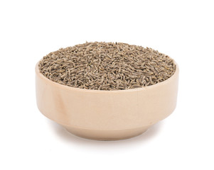 Pile of Dried Cumin Seeds Also know as caraway, jira or jeera seeds used in oriental cuisine isolated on white Background