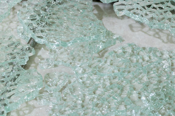 broken tempered glass closeup , background of glass was smashed.
