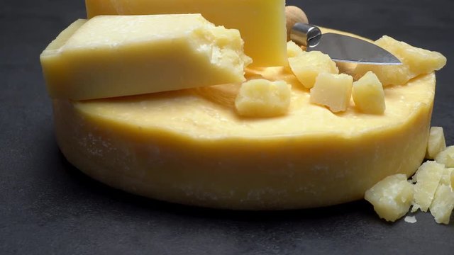 Video Whole round Head of parmesan or parmigiano hard cheese