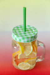 Homemade citrus lemonade in a glass jar