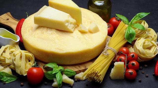 Video of Traditional italian food - parmesan cheese, pasta, tomato and olive oil