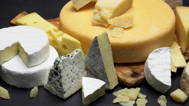 Video of various types of cheese - parmesan, brie, roquefort
