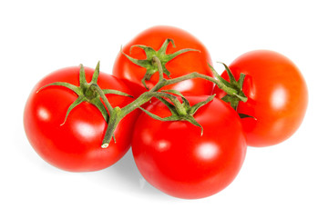 Bright red ripe tomatoes with ponytails isolated on white