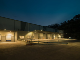 Fototapeta na wymiar Industrial Warehouse at Night