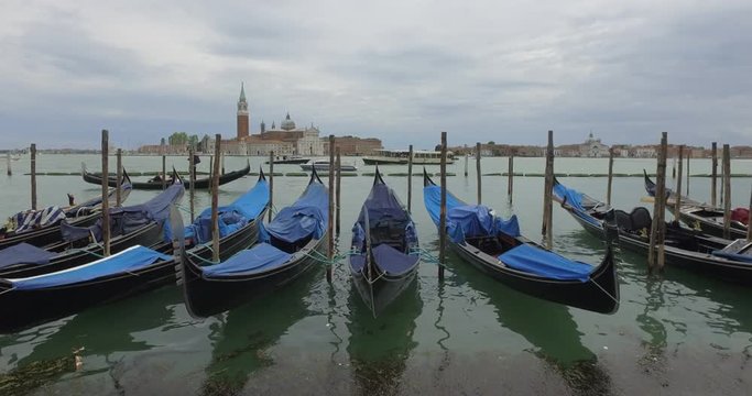 Gondolas in the Venice lagoon in front of Piazza San Marco, Italy
