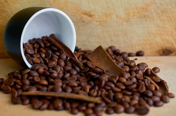 coffee beans, black Cup and cinnamon