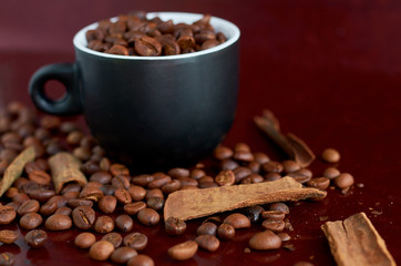 coffee beans, black Cup and cinnamon