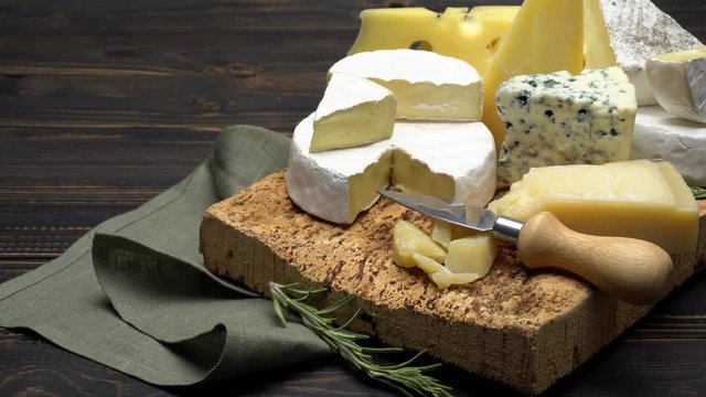 Video of various types of cheese - parmesan, brie, roquefort