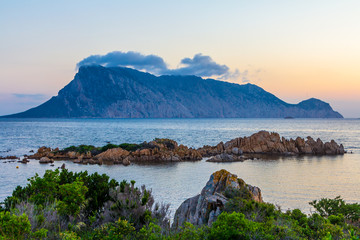 Sunrise behind Isola Tavolara, north east coast of Sardinia