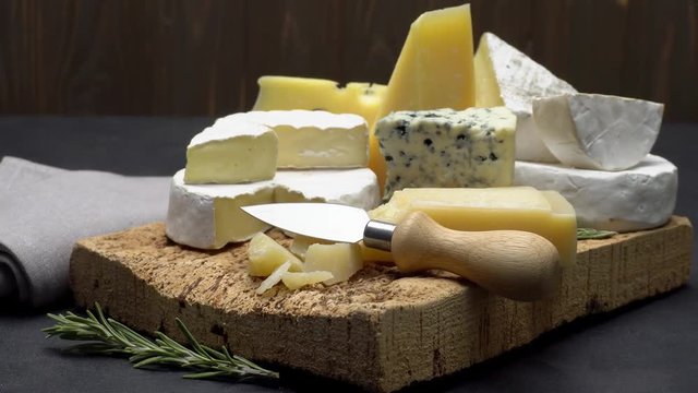 Video of various types of cheese - parmesan, brie, roquefort