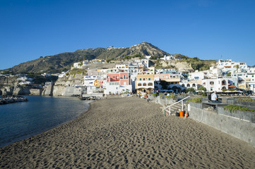 Fototapeta na wymiar Volcanic black sand beach at Sant'Angelo on Ischia in the Bay of Naples.