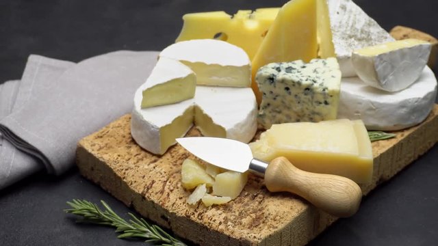 Video of various types of cheese - parmesan, brie, roquefort
