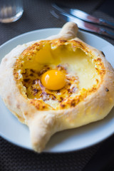 Ajarian or Adjaruli khachapuri