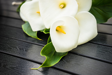 White calla lillies in bridal bouquet