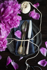 Summer table setting with peony