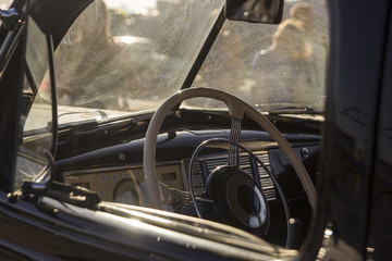 Retro car, vintage steering wheel clock