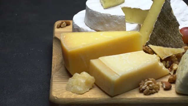 Video of various types of cheese - parmesan, brie, roquefort