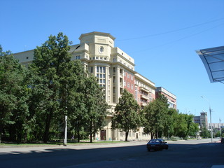 Architecture blue building building exterior built structure car City Clear sky day land vehicle...