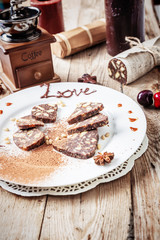 chocolate sausage on a wooden table
