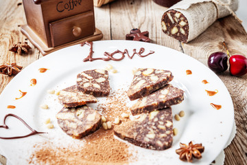chocolate sausage on a wooden table