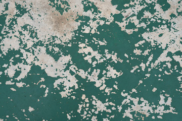 Green wall paint crack background