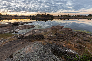 Sunrise in the Natural Area of Barruecos.  Malpartida de Caceres. Extremadura. Spain.