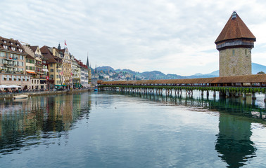 Fototapeta na wymiar Chapel wooden bridge (XIV c.) and water tower, Lucerne, Switzerland