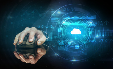 Hand using wireless mouse with cloud technology concept and dark background