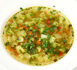 Italian minestrone soup (vegetable broth with ratatouille and parmesan cheese)