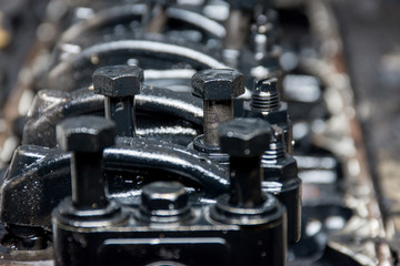 Details of a dirty diesel engine under the hood of a car
