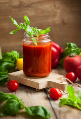 Spicy tomato drink in jars