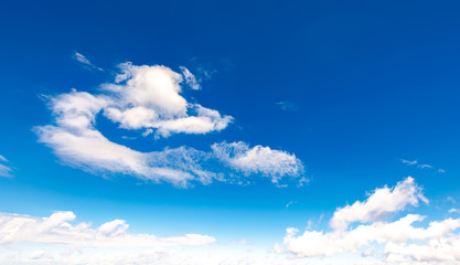 amazing cloud formations on a bright blue sky. beautiful cloudscape in summer