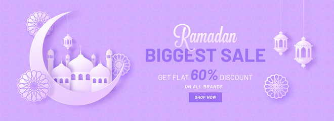 Ramadan biggest sale, website header or banner design with crescent moon, mosque on purple background. Paper-art design.