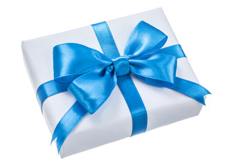Wrapped white gift box with blue knot isolated on white